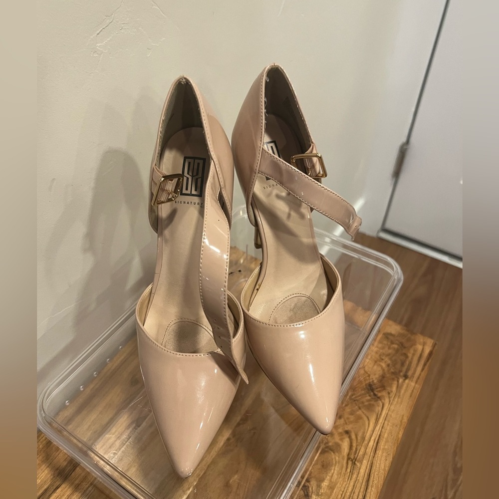 Signature Dorsay Nude Pumps.